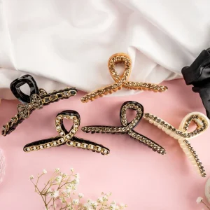 Form a low bun at the nape of your neck, securing it with a decorative hairpin, Hair Accessories
