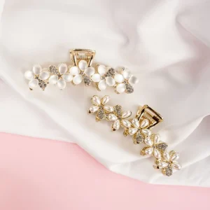 Gather hair into a high bun, secure with a hairpin, and fan out the ends for volume, Hair Accessories