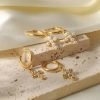Lila Hoop in gold