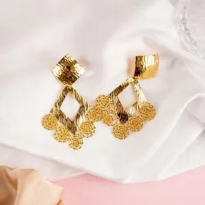 Rox Earring in gold Earring for a polished look.